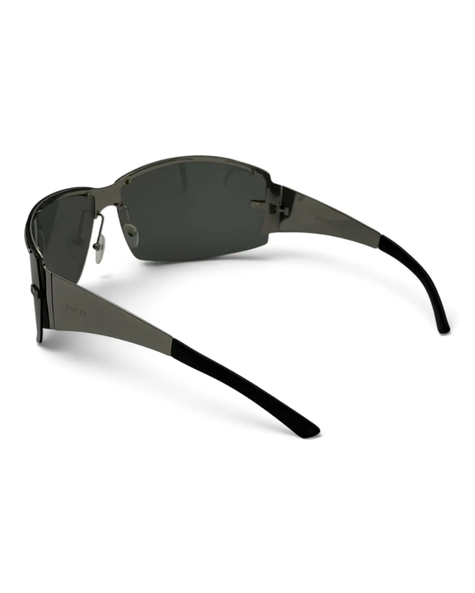 LUXVINTAGELISBON Gucci shield frame sunglasses in dark grey metal with dark lenses and logo detail on the temples.